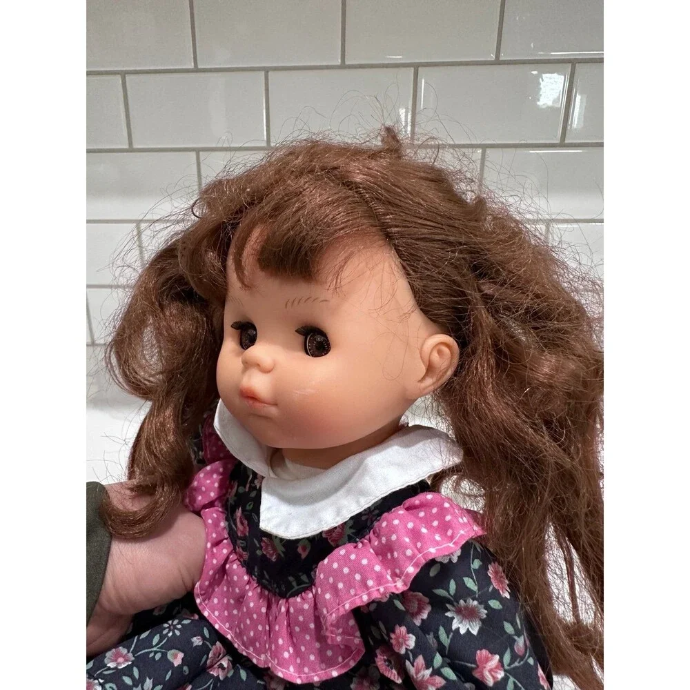 Vintage Brunette Girl Doll Floral Dress Brown Eyes Soft Body Collectible Toy
